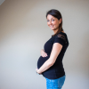 Zwangere vrouw met bolle buik